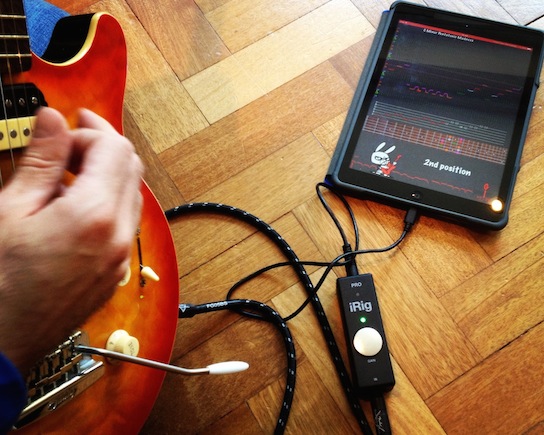 Playing Guitar Rabbit with an electric guitar through iRig PRO on an iPad